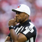 Jan 5, 2025; Glendale, Arizona, USA; NFL referee Shawn Smith during the Arizona Cardinals game against the San Francisco 49ers at State Farm Stadium. Mandatory Credit: Mark J. Rebilas-Imagn Images