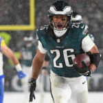 Jan 19, 2025; Philadelphia, Pennsylvania, USA; NFL; Philadelphia Eagles running back Saquon Barkley (26) runs for on a 78-yard touchdown run against the Los Angeles Rams during the fourth quarter in a 2025 NFC divisional round game at Lincoln Financial Field.