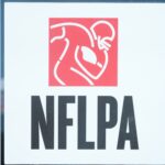 Feb 5, 2025; New Orleans, LA, USA; The NFLPA logo at press conference at the Super Bowl LIX media center at the Ernest N. Morial Convention Center. Mandatory Credit: Kirby Lee-Imagn Images