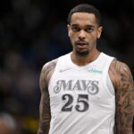 Feb 21, 2025; Dallas, Texas, USA; Dallas Mavericks forward P.J. Washington (25) looks on during the second half against the New Orleans Pelicans at the American Airlines Center.