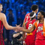 February 16, 2025; San Francisco, CA, USA; Chuck’s Global Stars center Nikola Jokic (15) of the Denver Nuggets and guard Donovan Mitchell (45, right) of the Cleveland Cavaliers react after defeating Chuck’s Global Stars during the 2025 NBA All Star Game at Chase Center. Mandatory Credit: Kyle Terada-Imagn Images