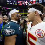 Feb 9, 2025; New Orleans, LA, USA; NFL; Philadelphia Eagles quarterback Jalen Hurts (1) greets Kansas City Chiefs quarterback Patrick Mahomes (15) following Super Bowl LIX at Ceasars Superdome.
