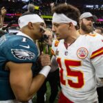 Feb 9, 2025; New Orleans, LA, USA; Philadelphia Eagles quarterback Jalen Hurts (1) greets Kansas City Chiefs quarterback Patrick Mahomes (15) following Super Bowl LIX at Ceasars Superdome.