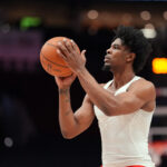Mar 12, 2025; Portland, Oregon, USA; Portland Trail Blazers guard Scoot Henderson (00) warms up before the game against the New York Knicks at Moda Center. Mandatory Credit: Soobum Im-Imagn Images