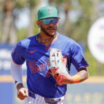 Mar 17, 2025; Port St. Lucie, Florida, USA; New York Mets outfielder Jose Siri (19) comes into the dugout during the first inning against the Tampa Bay Rays at Clover Park.