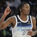 Bones Hyland Timberwolves Mar 21, 2025; Minneapolis, Minnesota, USA; Minnesota Timberwolves guard Bones Hyland (77) celebrates his basket against the New Orleans Pelicans in the fourth quarter at Target Center. Mandatory Credit: Bruce Kluckhohn-Imagn Images