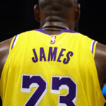 Mar 24, 2025; Orlando, Florida, USA; Los Angeles Lakers forward LeBron James (23) looks on against the Orlando Magic in the second quarter at Kia Center. Mandatory Credit: Nathan Ray Seebeck-Imagn Images