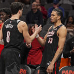 Apr 1, 2025; Atlanta, Georgia, USA; Portland Trail Blazers forwards Deni Avdija (8) and Toumani Camara (33) react late in the game against the Atlanta Hawks during the second half at State Farm Arena. Mandatory Credit: Dale Zanine-Imagn Images