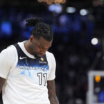 Apr 8, 2025; Milwaukee, Wisconsin, USA; Minnesota Timberwolves center Naz Reid (11) walks with his head down after a 110-103 loss to the Milwaukee Bucks at Fiserv Forum. Mandatory Credit: Michael McLoone-Imagn Images