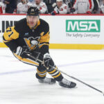 Apr 17, 2025; Pittsburgh, Pennsylvania, USA; Pittsburgh Penguins center Evgeni Malkin (71) skates with the puck against the Washington Capitals during the second period at PPG Paints Arena.