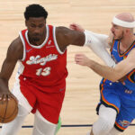 Apr 26, 2025; Memphis, Tennessee, USA; Memphis Grizzlies forward Jaren Jackson Jr. (13) dribbles as Oklahoma City Thunder guard Alex Caruso (9) defends during the first quarterduring game four for the first round of the 2024 NBA Playoffs at FedExForum. Mandatory Credit: Petre Thomas-Imagn Images
