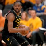 May 12, 2025; San Francisco, California, USA; Golden State Warriors forward Jonathan Kuminga (00) holds onto the ball against the Minnesota Timberwolves in the fourth quarter during game four of the second round for the 2025 NBA Playoffs at Chase Center.