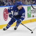 May 14, 2025; Toronto, Ontario, CAN; Toronto Maple Leafs forward Matthew Knies (23) carries the puck against the Florida Panthers during the first period of game five of the second round of the 2025 Stanley Cup Playoffs at Scotiabank Arena. Mandatory Credit: John E. Sokolowski-Imagn Images