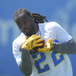 May 20, 2025; El Segundo, CA, USA; Los Angeles Chargers running back Najee Harris (22) catches the ball during offseason workouts at The Bolt. Mandatory Credit: Kirby Lee-Imagn Images