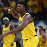 May 31, 2025; Indianapolis, Indiana, USA; Indiana Pacers center Thomas Bryant (3) celebrates after a three-point basket against the New York Knicks in the third quarter during game six of the eastern conference finals for the 2025 NBA Playoffs at Gainbridge Fieldhouse.