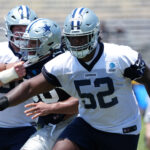 Jul 22, 2025; Oxnard, CA, USA; Dallas Cowboys guard Tyler Booker (52) during training camp at the River Ridge Fields. Mandatory Credit: Kirby Lee-Imagn Images