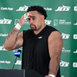 Jul 24, 2025; Florham Park, NY, USA; New York Jets guard Alijah Vera-Tucker (75) speaks to the media during training camp at Atlantic Health Jets Training Center. Mandatory Credit: John Jones-Imagn Images