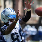 Jul 26, 2025; Oxnard, CA, USA; Dallas Cowboys receiver CeeDee Lamb (88) catches the ball at training camp at the River Ridge Fields. Mandatory Credit: Kirby Lee-Imagn Images
