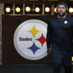 Aug 16, 2025; Pittsburgh, Pennsylvania, USA; Pittsburgh Steelers defensive tackle Cameron Heyward (97) takes the field to warm up before the game against the Tampa Bay Buccaneers at Acrisure Stadium. Mandatory Credit: Charles LeClaire-Imagn Images