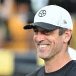 Aug 16, 2025; Pittsburgh, Pennsylvania, USA; Pittsburgh Steelers quarterback Aaron Rodgers (8) watches introductions during a game against the Tampa Bay Buccaneers at Acrisure Stadium. Mandatory Credit: Barry Reeger-Imagn Images