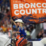 Aug 16, 2025; Denver, Colorado, USA; Denver Broncos celebrate a score during the second half against the Arizona Cardinals at Empower Field at Mile High. Mandatory Credit: Ron Chenoy-Imagn Images