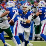 NFL; Buffalo Bills quarterback Josh Allen (17) runs with the ball for a gain of about eight-yards during first half action at the Bills home game against the New York Jets at Highmark Stadium in Orchard Park on Dec. 29, 2024.