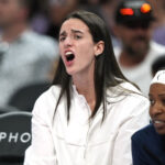Aug 31, 2025; San Francisco, California, USA; Indiana Fever guard Caitlin Clark (center) yells from the bench during the second quarter against the Golden State Valkyries at Chase Center.