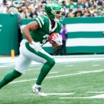 New York Jets wide receiver Xavier Gipson (3) runs after catching the punt, Sunday, September 7, 2025, in East Rutherford.