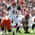 Sep 7, 2025; Cleveland, Ohio, USA; Cincinnati Bengals quarterback Joe Burrow (9) audibles during the second half against the Cleveland Browns at Huntington Bank Field. Mandatory Credit: Scott Galvin-Imagn Images