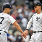 Sep 7, 2025; Bronx, New York, USA; New York Yankees designated hitter Giancarlo Stanton (27) celebrates with New York Yankees right fielder Aaron Judge (99) after the game against the Toronto Blue Jays at Yankee Stadium. Mandatory Credit: Mark Smith-Imagn Images