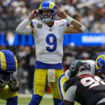 Sep 7, 2025; Inglewood, California, USA; Los Angeles Rams quarterback Matthew Stafford (9) signals during the third quarter at SoFi Stadium. Mandatory Credit: Kiyoshi Mio-Imagn Images