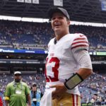 Sep 7, 2025; Seattle, Washington, USA; San Francisco 49ers quarterback Brock Purdy (13) reacts after the game against the Seattle Seahawks during the fourth quarter at Lumen Field. Mandatory Credit: Joe Nicholson-Imagn Images