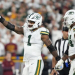 Sep 11, 2025; Green Bay, Wisconsin, USA; Green Bay Packers defensive end Micah Parsons (1) reacts in the first quarter against the Washington Commanders at Lambeau Field. Mandatory Credit: Jeff Hanisch-Imagn Images