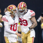 Sep 14, 2025; New Orleans, Louisiana, USA; San Francisco 49ers quarterback Mac Jones (10) celebrate a touchdown pass to tight end Luke Farrell (89) against the New Orleans Saints during the first half at Caesars Superdome. Mandatory Credit: Stephen Lew-Imagn Images
