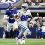 CeeDee Lamb Cowboys Lesão Sep 14, 2025; Arlington, Texas, USA; Dallas Cowboys wide receiver CeeDee Lamb (88) runs with the ball against the New York Giants during the second quarter at AT&T Stadium. Mandatory Credit: Raymond Carlin III-Imagn Images