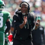Sep 14, 2025; East Rutherford, New Jersey, USA; New York Jets head coach Aaron Glenn reacts during the first half at MetLife Stadium. Mandatory Credit: Vincent Carchietta-Imagn Images