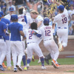 Sep 14, 2025; New York City, New York, USA; New York Mets first baseman Pete Alonso (20) is congratulated by teammates at home plate after hitting a walk off three run home run against the Texas Rangers during the tenth inning at Citi Field. Mandatory Credit: Gregory Fisher-Imagn Images