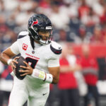 Sep 15, 2025; Houston, Texas, USA; Houston Texans quarterback C.J. Stroud (7) drops back to pass during the first quarter against the Tampa Bay Buccaneers at NRG Stadium. Mandatory Credit: Troy Taormina-Imagn Images