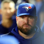 Sep 16, 2025; St. Petersburg, Florida, USA; Toronto Blue Jays manager John Schneider (14) looks on during the second inning ]against the Tampa Bay Rays at George M. Steinbrenner Field. Mandatory Credit: Kim Klement Neitzel-Imagn Images