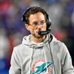 Sep 18, 2025; Orchard Park, New York, USA; Miami Dolphins head coach Mike McDaniel looks on in the first quarter against the Buffalo Bills at Highmark Stadium. Mandatory Credit: Mark Konezny-Imagn Images