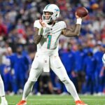 Tua Tagovailoa Dolphins Sep 18, 2025; Orchard Park, New York, USA; Miami Dolphins quarterback Tua Tagovailoa (1) passes against the Buffalo Bills in the second quarter at Highmark Stadium. Mandatory Credit: Mark Konezny-Imagn Images