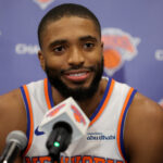 Sep 23, 2025; New York, NY, USA; New York Knicks forward Mikal Bridges speaks to the media during a media day press conference at the Madison Square Garden training center. Mandatory Credit: Brad Penner-Imagn Images