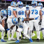 Detroit Lions running back Jahmyr Gibbs celebrates a touchdown against the Baltimore Ravens with wide receiver Amon-Ra St. Brown and the offensive line during the first half at M&T Bank Stadium in Baltimore, Md. on Monday, Sept. 22, 2025.