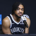 Sep 23, 2025; Brooklyn, NY, USA; Brooklyn Nets guard Cam Thomas (24) speaks at Media Day. Mandatory Credit: Wendell Cruz-Imagn Images
