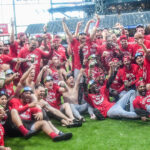 Sep 28, 2025; Milwaukee, Wisconsin, USA; Cincinnati Reds pose for a team picture after clinching a MLB playoff spot after game against the Milwaukee Brewers at American Family Field.