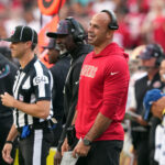 Sep 28, 2025; Santa Clara, California, USA; San Francisco 49ers defensive coordinator Robert Saleh (in red) reacts to a penalty during the third quarter against the Jacksonville Jaguars at Levi's Stadium.