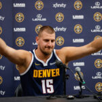 Sep 29, 2025; Denver, CO, USA; Denver Nuggets player Nikola Jokic (15) takes questions during media day at Ball Arena.
