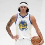 Sep 29, 2025; San Francisco, CA, USA; Golden State Warriors forward Gui Santos (15) holds onto the ball during Media Day at the Chase Center.
