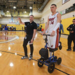 Sep 29, 2025; Miami, FL, USA; Miami Heat guard Tyler Herro (14) rides a knee scooter during media day at Kaseya Center. Mandatory Credit: Sam Navarro-Imagn Images