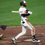 Sep 10, 2025; Baltimore, Maryland, USA; Baltimore Orioles outfielder Dylan Beavers (12) hits a walk off RBI single during a game against Pittsburgh Pirates at Oriole Park at Camden Yards.